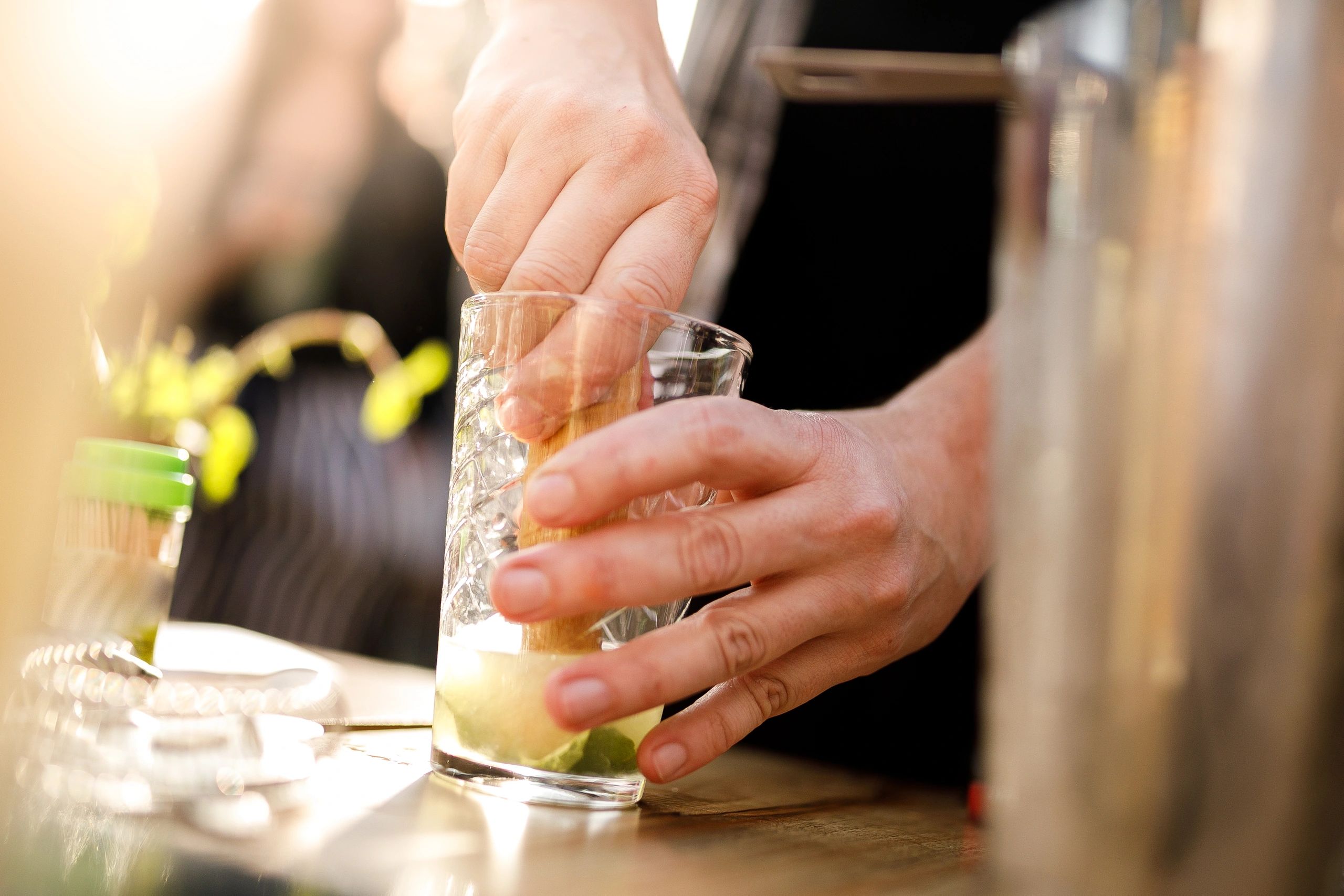 Bartender preparing drinks at a cocktail event