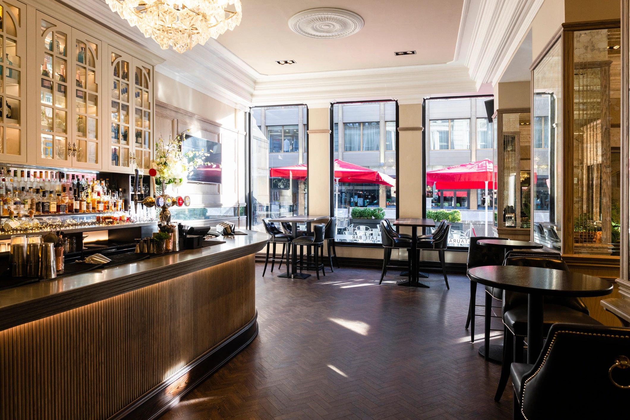 Luxurious bar interior with seating and warm lighting