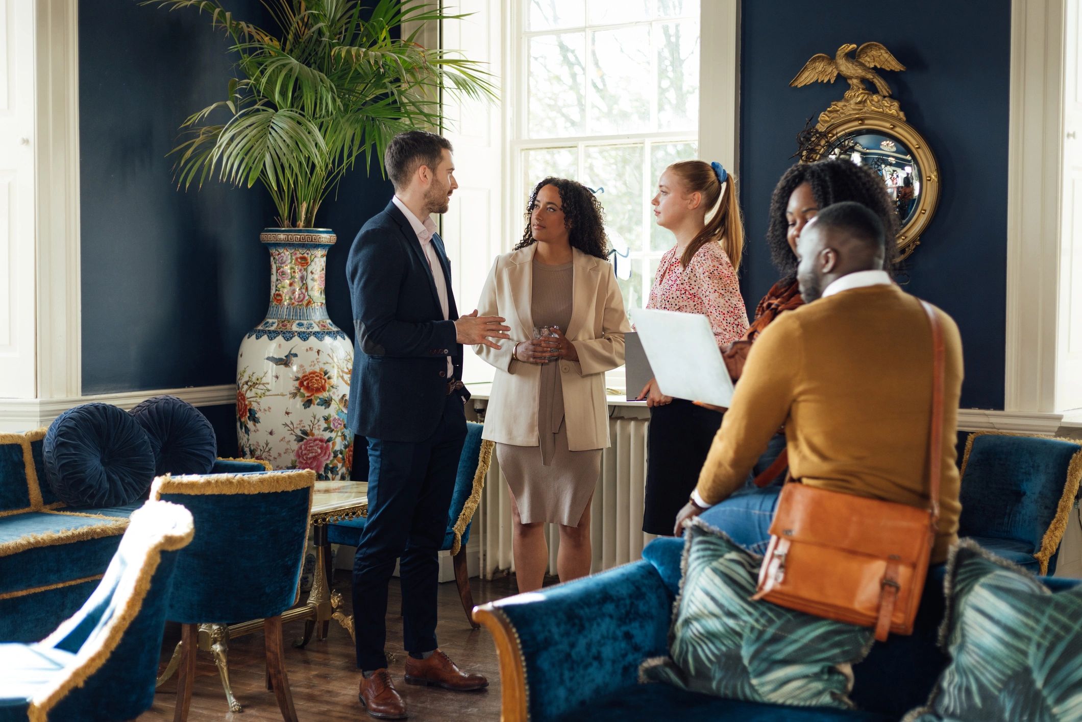 Professionals networking at a corporate reception