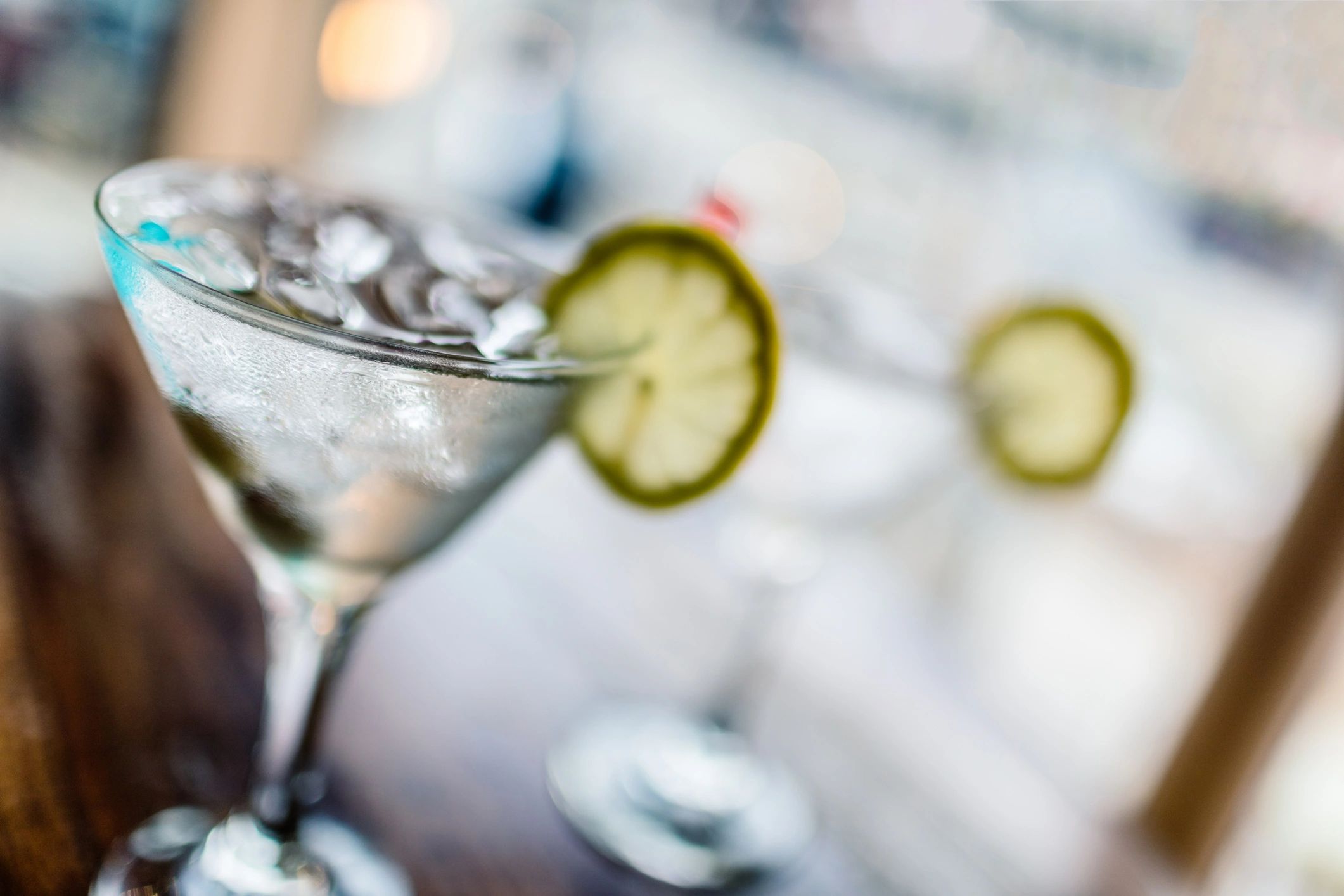 Two martinis on a bar